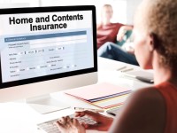 Woman-Buying-Homeowners-Insurance-Online.jpg