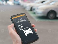 hand-using-mobile-phone-device-to-access-an-online-car-insurance-platform-customers-can-compare-quotes-with-this-innovative-solution-file-claims-and-access-roadside-assistance-right-photo.jpg